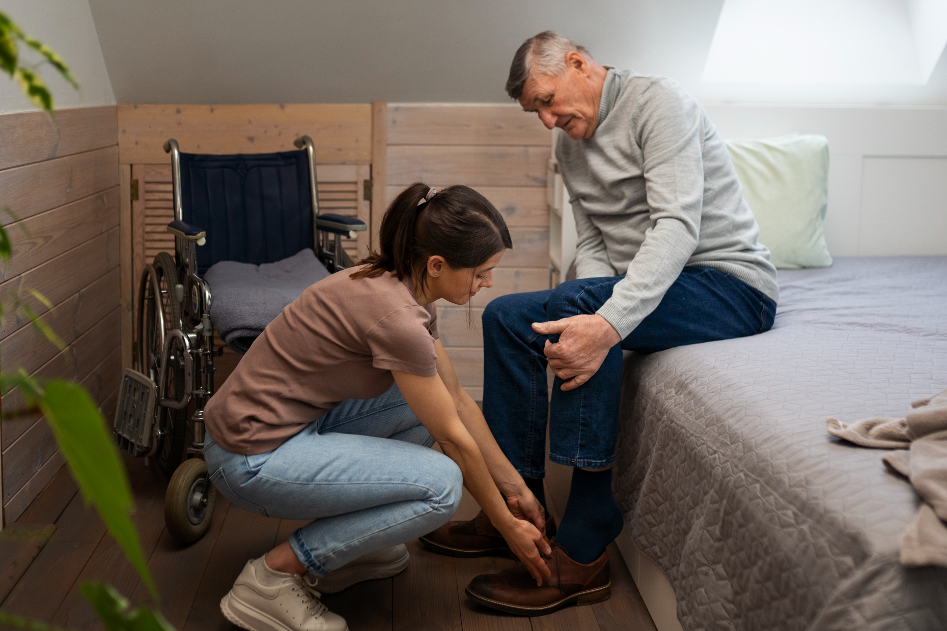 elderly-person-being-taken-care-by-female-caretaker Signs It May Be Time to Consider Assisted Living for a Loved One